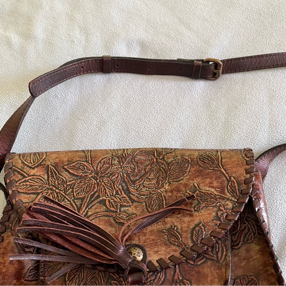 Patricia Nash
Beaumont Flap Burnished Tooled Crossbody, EUC - Picture 10 of 12